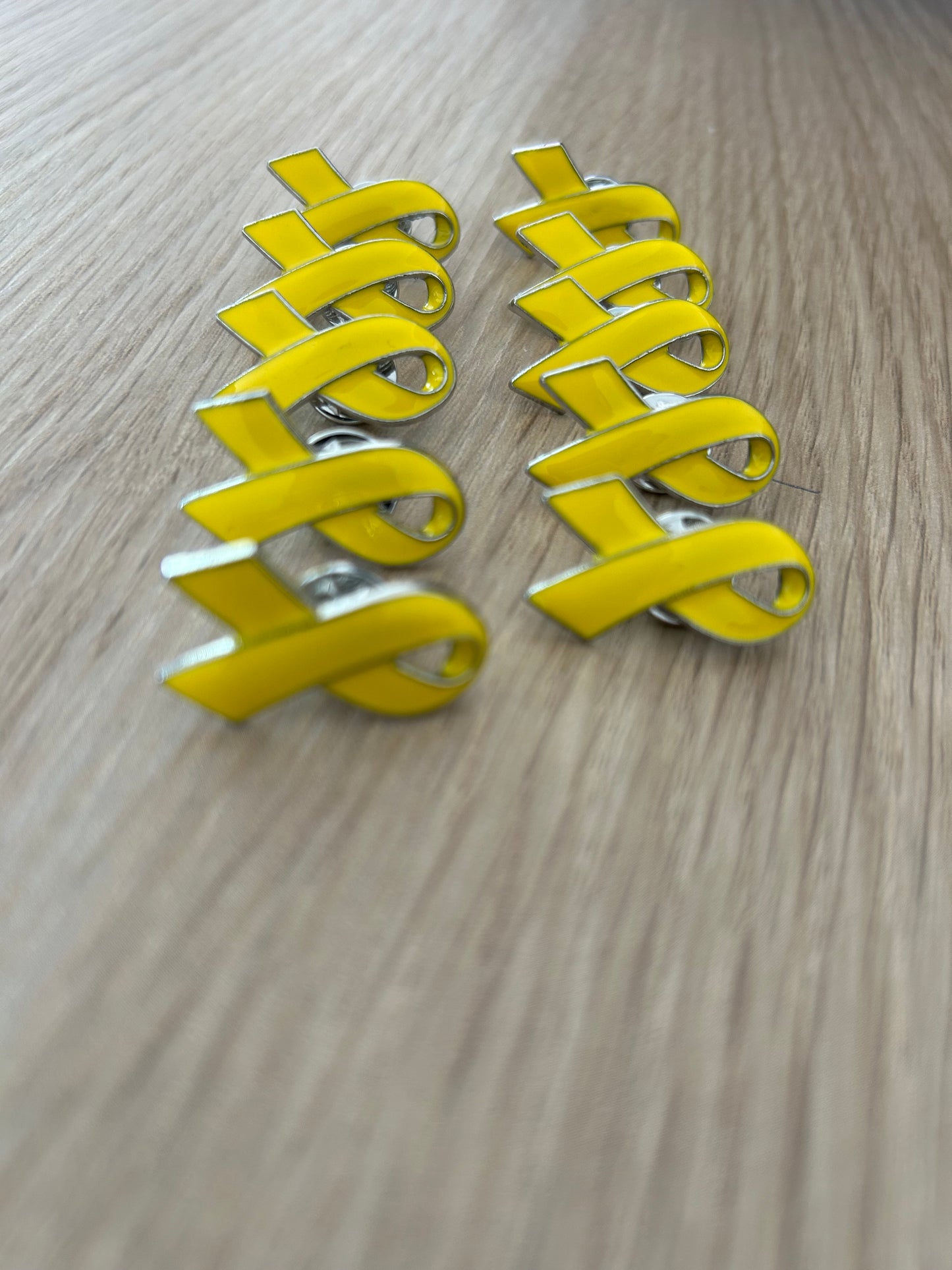 Lot de 10 pins métal jaune de soutien