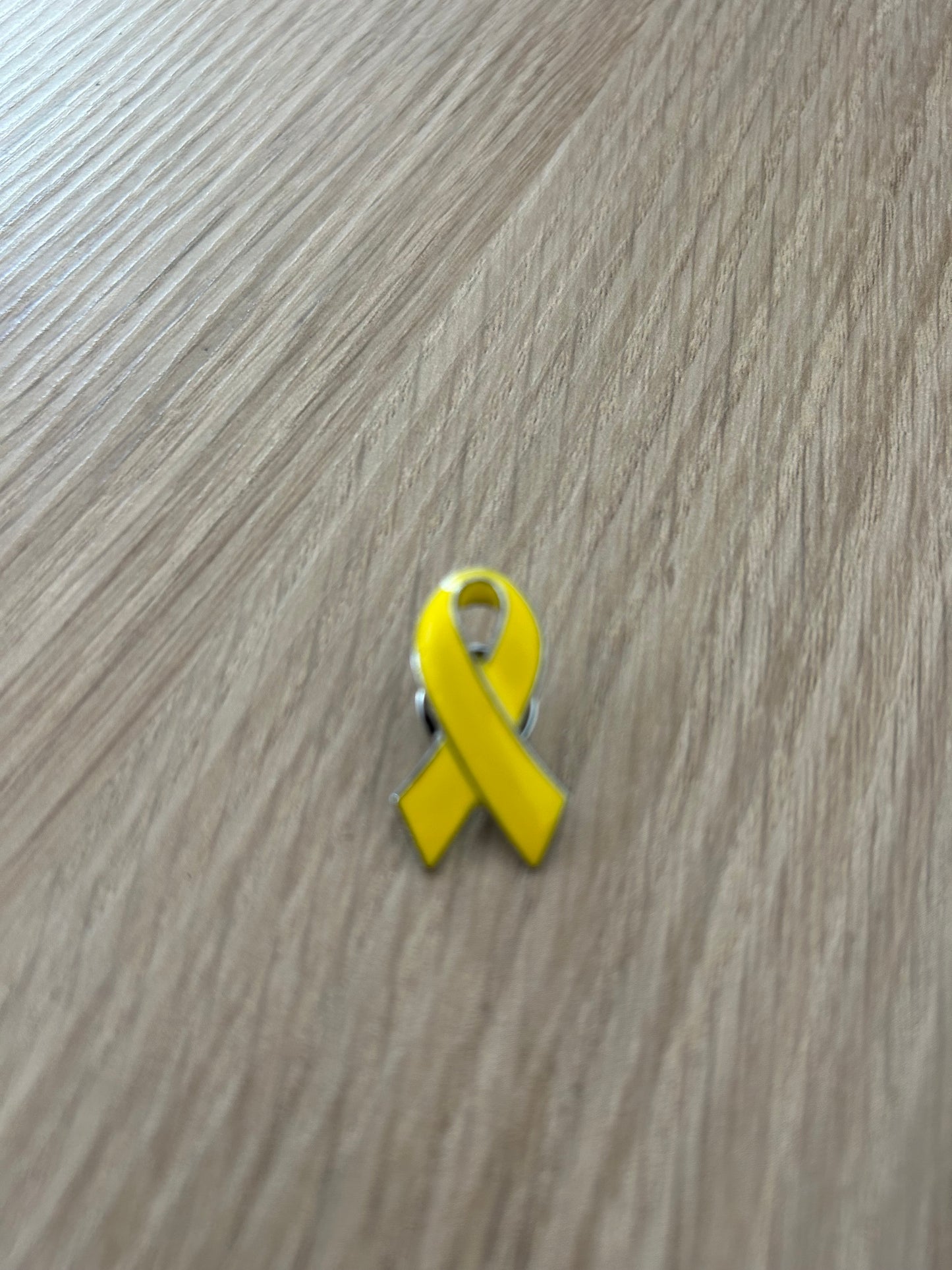 Lot de 10 pins métal jaune de soutien